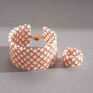 Exquisite handmade beaded jewelry set featuring magnetic clasp bracelet and ring.