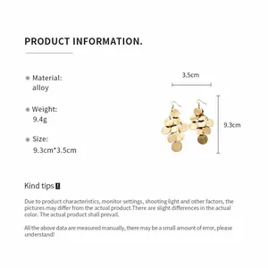 Detailed view of gold geometric disc tassel earrings with dimensions and material info