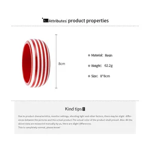 Detail view of a red and white striped resin bangle with size and weight specs.