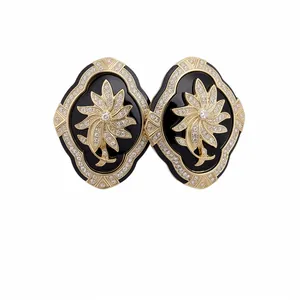 Vintage style floral stud earrings with black enamel and gold crystal inlay