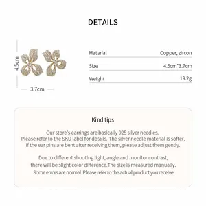 Detailed specifications showing material, size, and weight for butterfly flower stud earrings.
