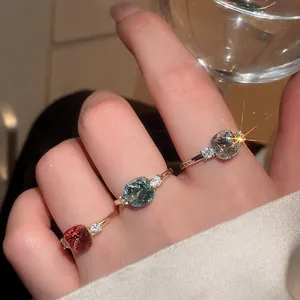 Elegant vintage geometric rings with sparkling colorful zircon stones in gold and silver