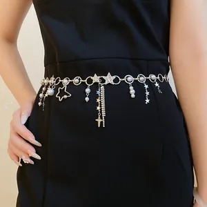 Close-up view of silver star pearl tassel waist chain on black dress accessories