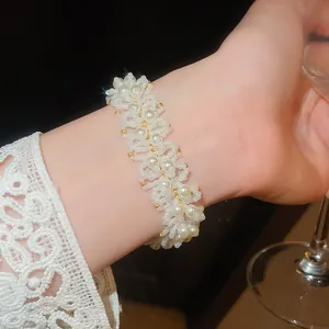 Elegant French style white beaded pearl bracelet featuring a vintage court design on wrist