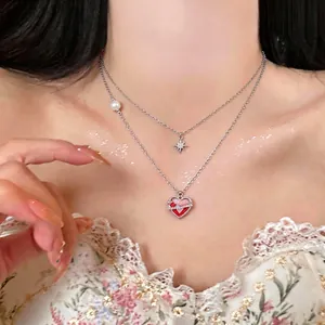Sweet Korean style layered silver heart necklace with zircon star and pearl on model