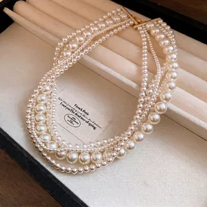 Elegant French style multi-strand pearl choker necklace for minimalist fashion style.