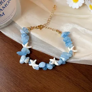Bracelet en aigue-marine fait main avec pierres bleues et breloques étoile de mer