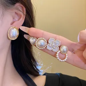 Pendientes Perla Artificial Simples Aleación Oro Corazón Flor Ovalados Poste Plata Moda Joyería de Lujo