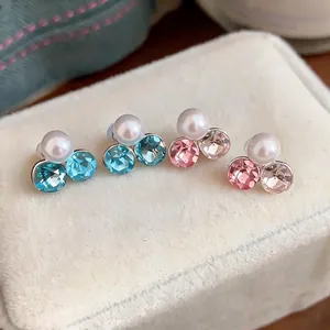 Elegant non-pierced clip-on earrings featuring white pearls and colorful faceted crystals