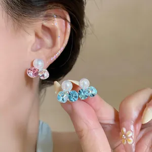 Elegant pearl and rhinestone non-pierced ear clips in pink and blue colors