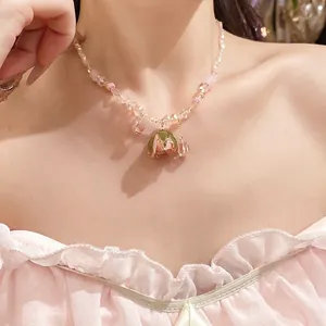 Exquisite French romantic amethyst beaded necklace with a dried pink rose pendant on model