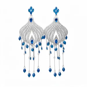 Vintage ethnic silver chandelier earrings with blue glass teardrop tassels for elegant women