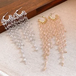 Elegant silver and gold finish crystal tassel drop earrings for a sophisticated look