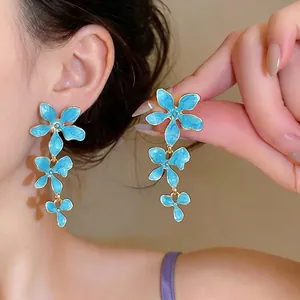 Elegant blue enamel flower tassel drop earrings with silver needles for women