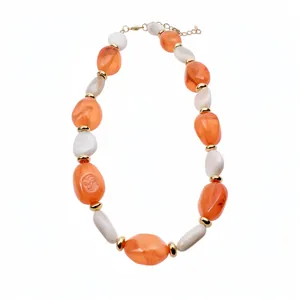 Vintage elegant acrylic necklace with orange and beige geometric oval beads for women