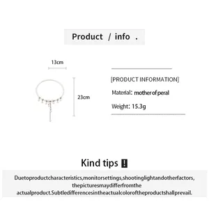 Detailed view of pearl tassel collar with material info and 13cm x 23cm dimensions.
