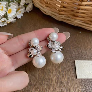 French style zircon and pearl clip-on earrings featuring a unique fireworks design