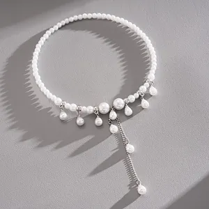 Elegant pearl choker necklace with water-drop charms and silver tassel detail