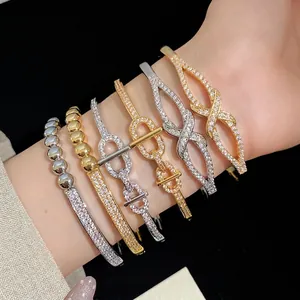 Élégant Jonc en Cuivre Plaqué Or 1,8 K pour Femme Bracelet Ovale Ajouré en Zircone Brillant Serti de Strass Bijoux de Mode
