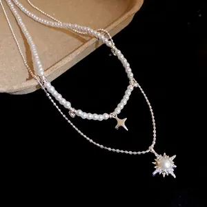 Elegante doppellagige Perlenhalskette mit Zirkonia-Sternanhänger für stilvolle Damen