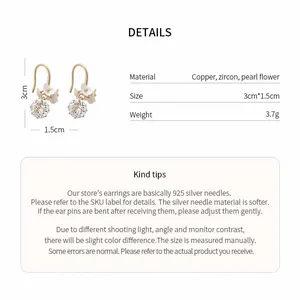Detail view of French style flower earrings with specifications and dimensions