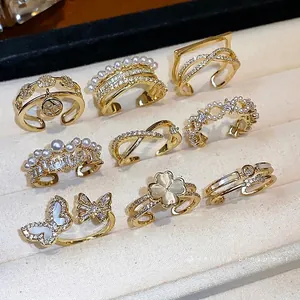 Set di anelli placcati in oro 14 carati con perle e zirconi in vari design eleganti