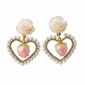 Elegant 14k gold plated heart dangle earrings featuring white rose and pearl strawberry