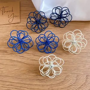 Korean style spray-painted flower stud earrings with a unique niche winding wire design