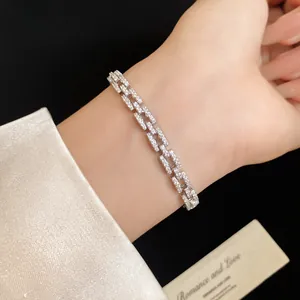 Detailed view of a luxury 14k gold plated bracelet with sparkling zircon stones