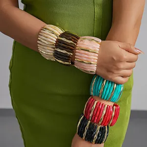 Chunky acrylic marbled stretch bracelets with gold-tone accents for women detail