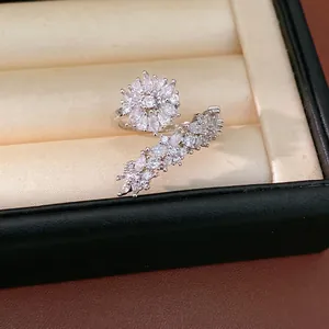 Vintage silver flower ring with sparkling marquise-cut cubic zirconia in jewelry box