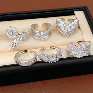 Detailed view of six vintage silver-colored rings with sparkling cubic zirconia