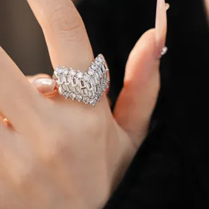 Detail shot of an exquisite V-shaped ring with brilliant zircon stones for women