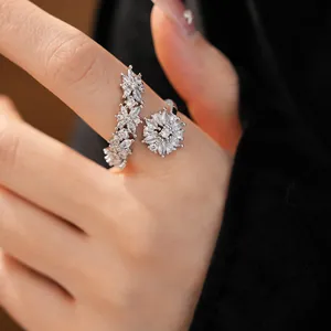 Close-up of elegant flower open ring with sparkling marquise cut cubic zirconia