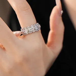Detailed macro view of vintage multi-row silver ring with sparkling white zircons