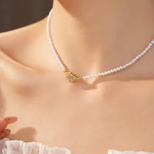 Elegant 18K gold plated pearl choker necklace with a zircon rhombus pendant