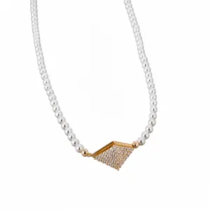 Elegant 18K gold plated pearl necklace with a geometric rhombus cubic zirconia pendant