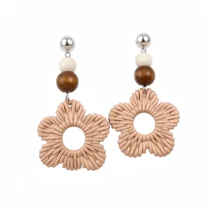 Elegant resort style resin flower drop earrings featuring wooden beads and silver posts
