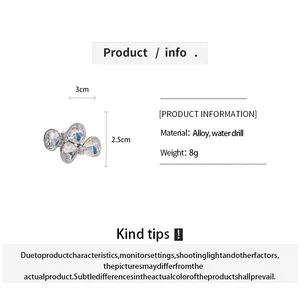 Détails techniques d'une bague nœud en strass avec taille et infos sur les matériaux