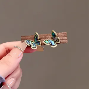 Retro sea shell butterfly stud earrings with sparkling micro-zircon border