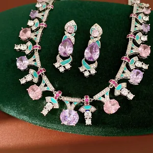 Palace style luxury jewelry set with pink zircon necklace and matching drop earrings on velvet