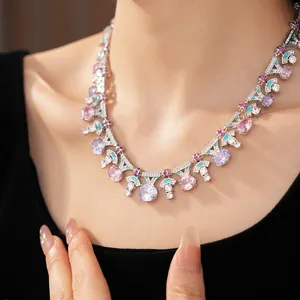 Close-up of palace style necklace with colorful zircons and turquoise enamel detail