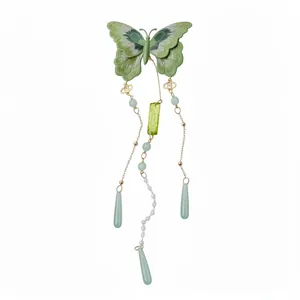 Élégante pince à cheveux papillon vert avec glands en perles de style traditionnel chinois