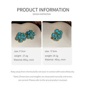 Vintage palace style resin flower earrings and ring set with golden alloy detailing