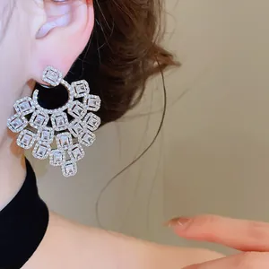 Elegant luxury silver-colored chandelier earrings with sparkling cubic zirconia for women