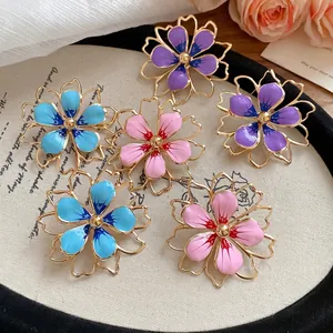 Elegant set of colorful metal hollow flower pendants for sweet vacation style jewelry design