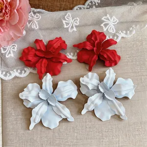 Oversized minimalist matte spray-painted flower stud earrings in vibrant red and white