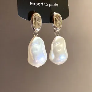 French vintage baroque pearl drop earrings with S925 silver needle in silver finish.