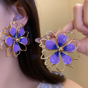 Elegant purple hollow metal flower earrings with enamel drip oil finish for women