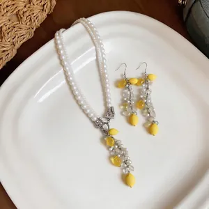 Chic pearl crystal resin lemon tassel jewelry set including necklace and earrings